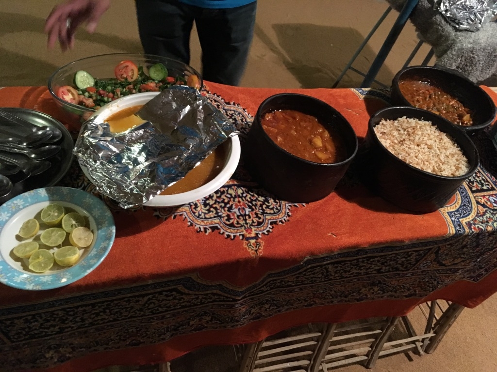 Nubian dinner with salad, vegetable stew, potato stew, rice