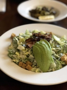 veganized salad with vegan caesar dressing and mushrooms